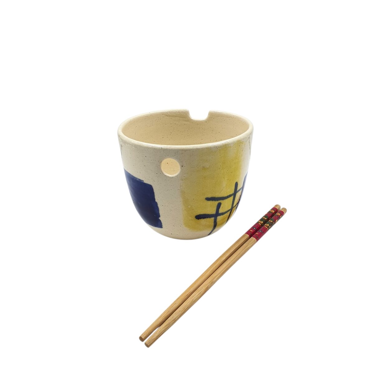 The yellow-washed side of the handmade stoneware ramen bowl