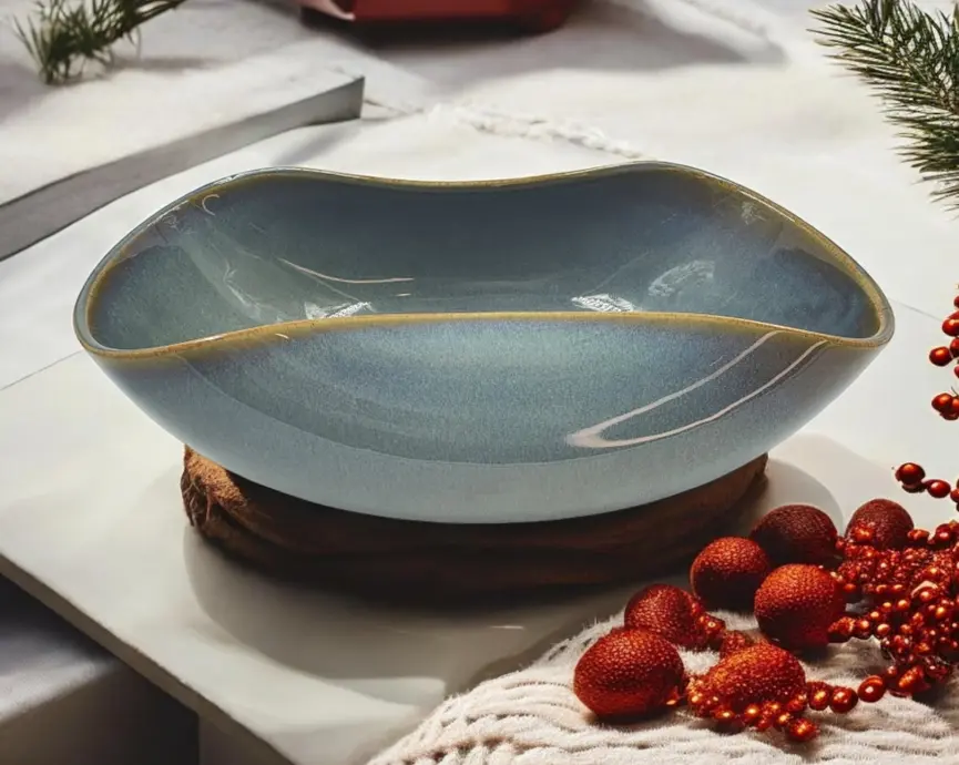 Elegant blue curved fusion serving bowl with glossy finish